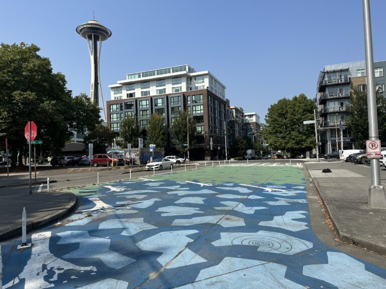 Pickleball For All event location on Taylor Avenue in Seattle, with the Space Needle in the background.